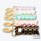 LippyClip Lip Balm Holder - Gold Quatrefoil on White LippyClip® Lip Balm Holder