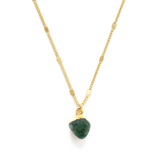 Raw cut emerald gemstone